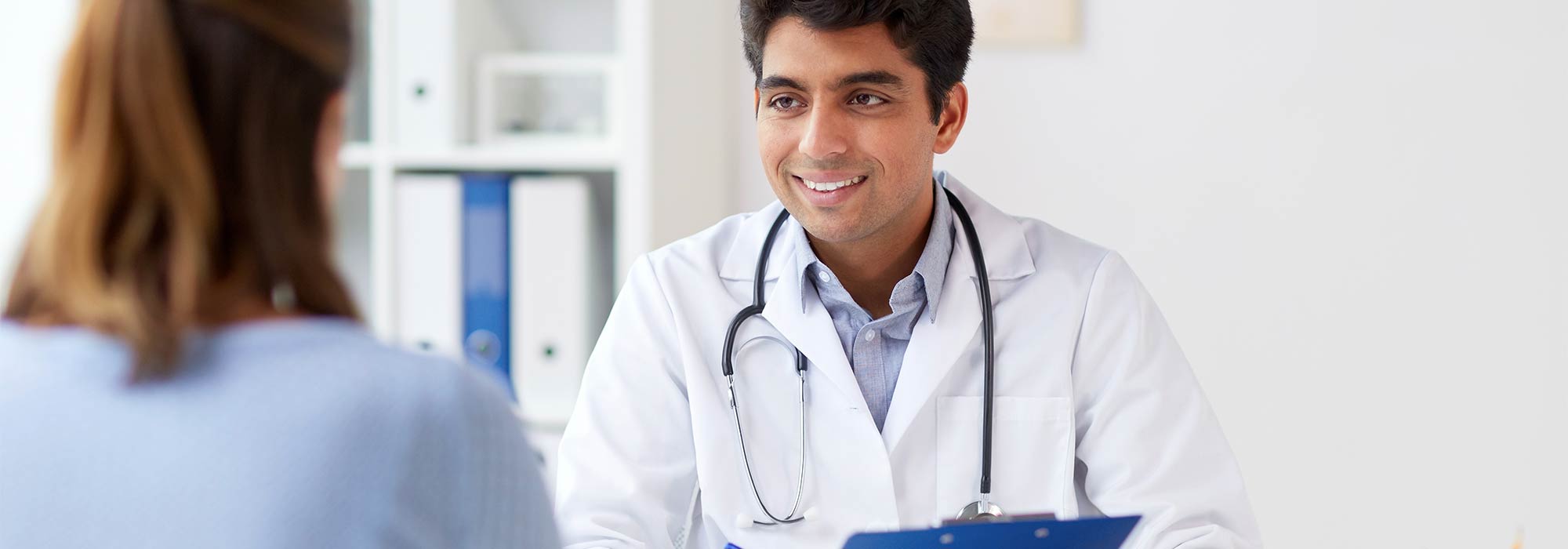 Doctor Consulting with Patient